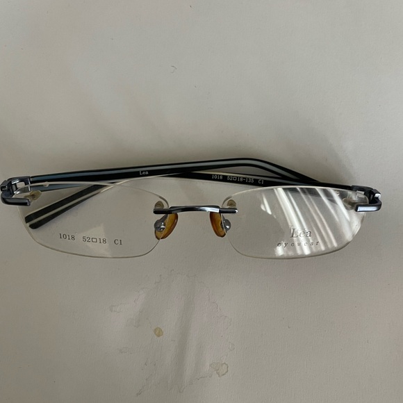 Black and Silver Rimless Glasses - Picture 1 of 5